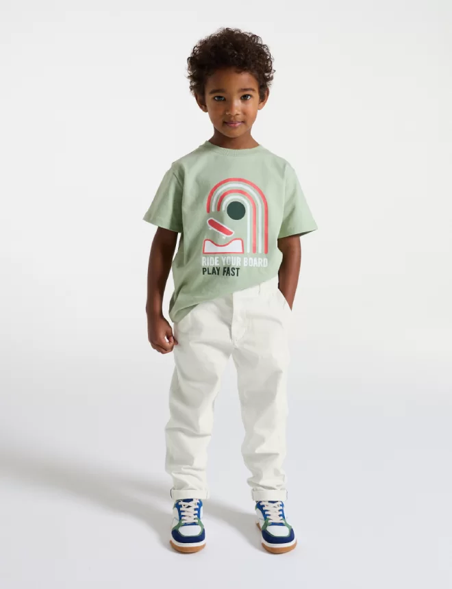 Boys' plain white chino trousers